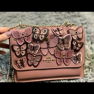 Purple butterfly coach purse